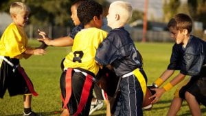 Co-ed flag football league keeps kids active, helps them learn the game